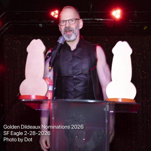 Executive Director Bob Goldfarb Displays His Woodys